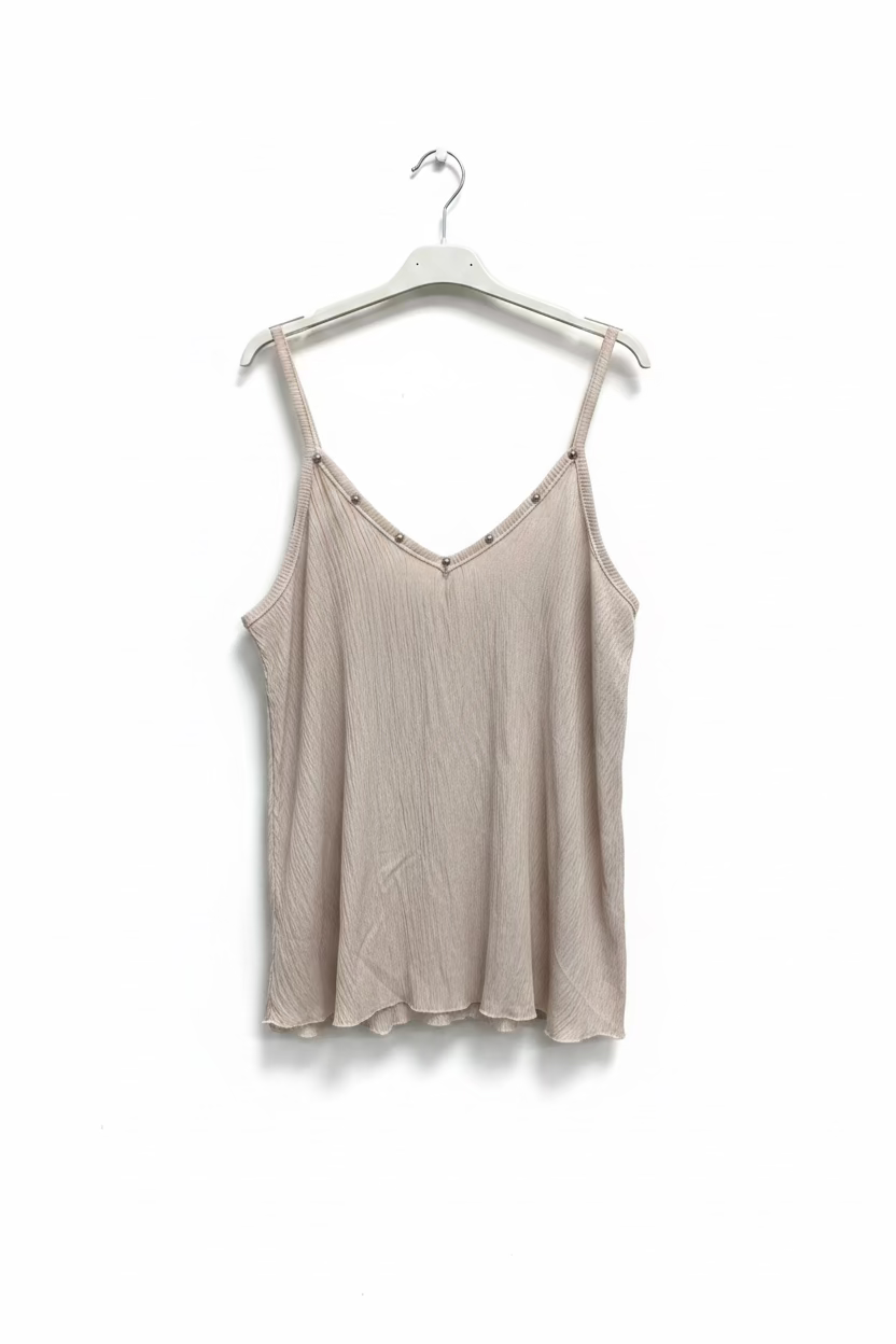 Top de tachuelas