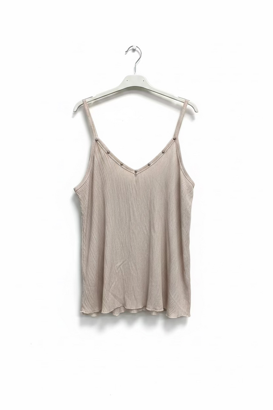 Top de tachuelas